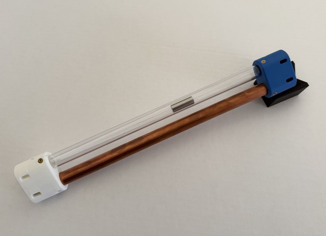 Dual-tube Lenz’s law demonstrator with a copper tube, a clear control tube, and printed end caps.